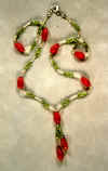 0033: Austrian silver, Japanese glass, faceted peridot necklace