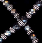 0054: Hematite with silver daisies necklace