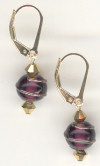 0122: purple glass with bronze wire swirled spheres